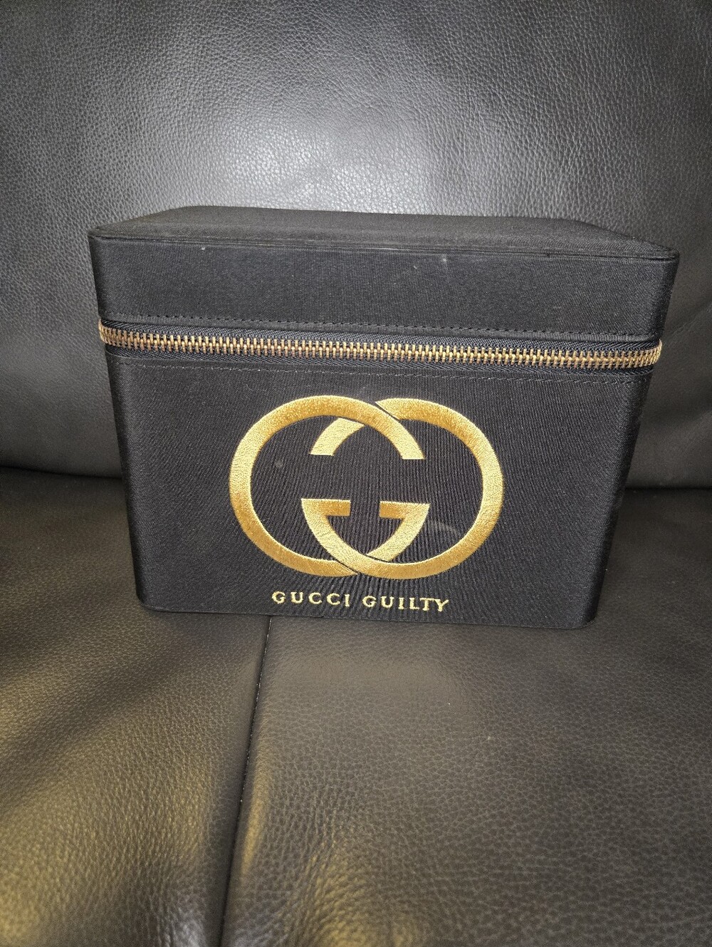 Gucci Black and Gold Travel Case